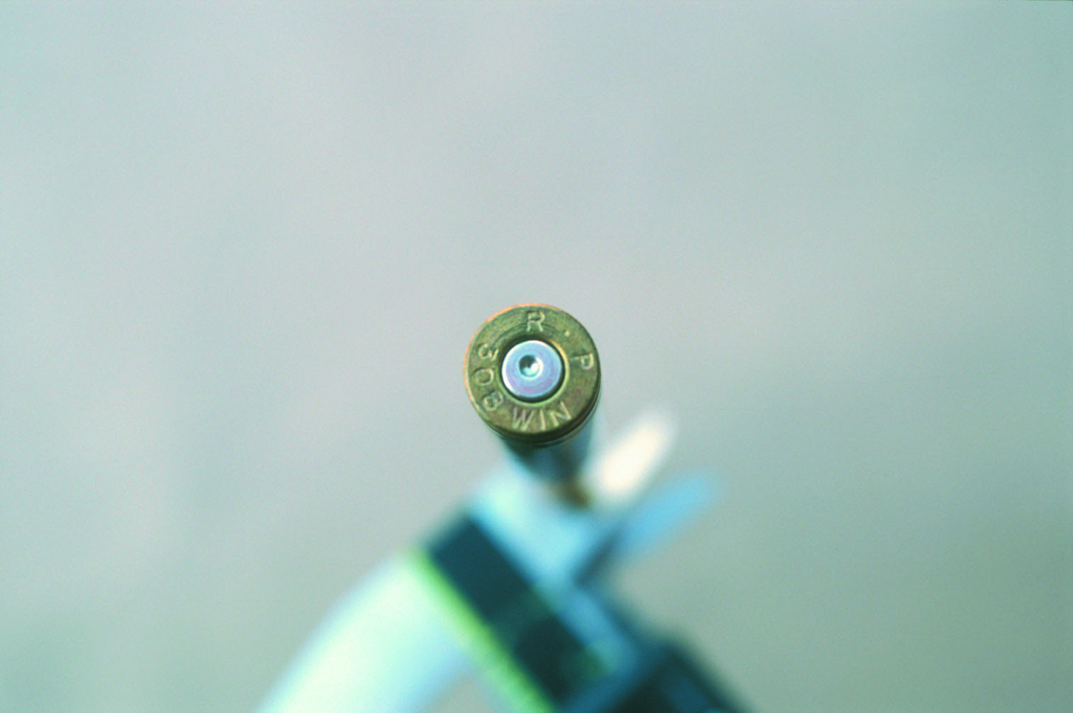 Flattened primers are common with factory ammunition and are not an indicator of high or excess pressure. This Remington .308 Winchester load has a flattened primer but is completely safe.